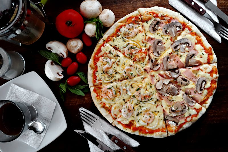 Mushroom and truffle oil thin crust pizza